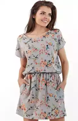 - komfortowa sukienka 
- model z krótkim rękawem
- wykonana z kwiecistej tkaniny 
- w pasie gumka